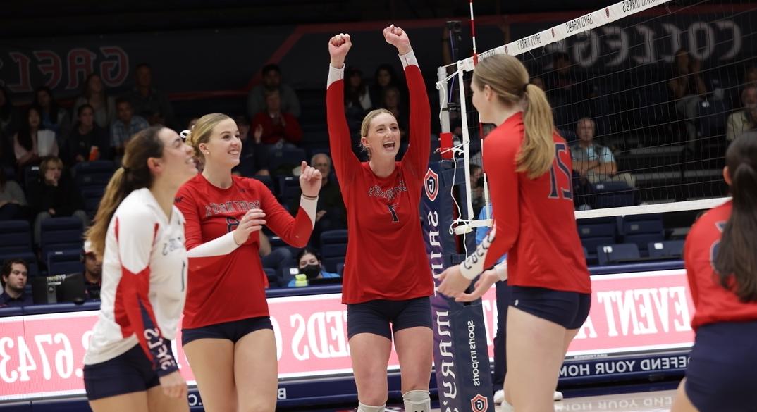 Saint Mary's volleyball players cheering